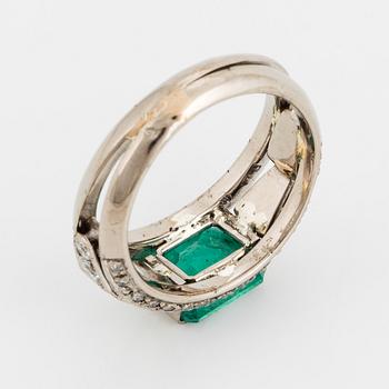 A Mandelstam emerald and diamond ring.