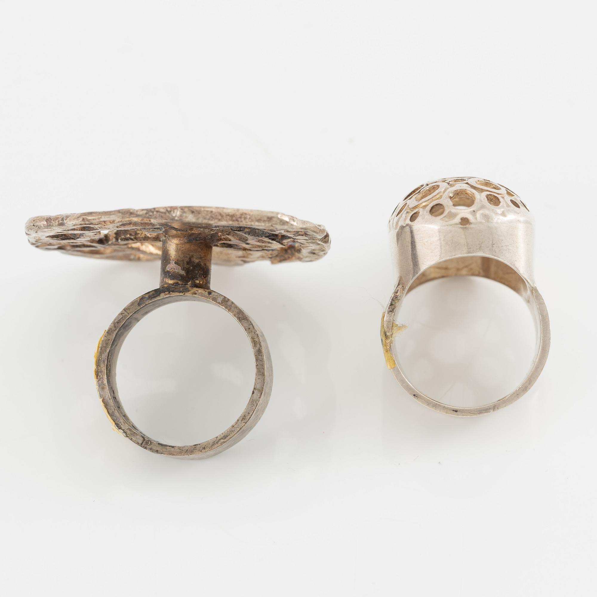 Lars Arby, fyra ringar, silver, en med tigeröga.