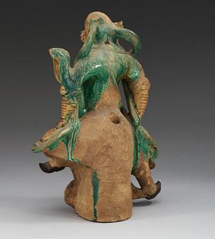 A glazed Ming dynasty rooftile figure of a guardsman, Ming dynasty (1368-1644).