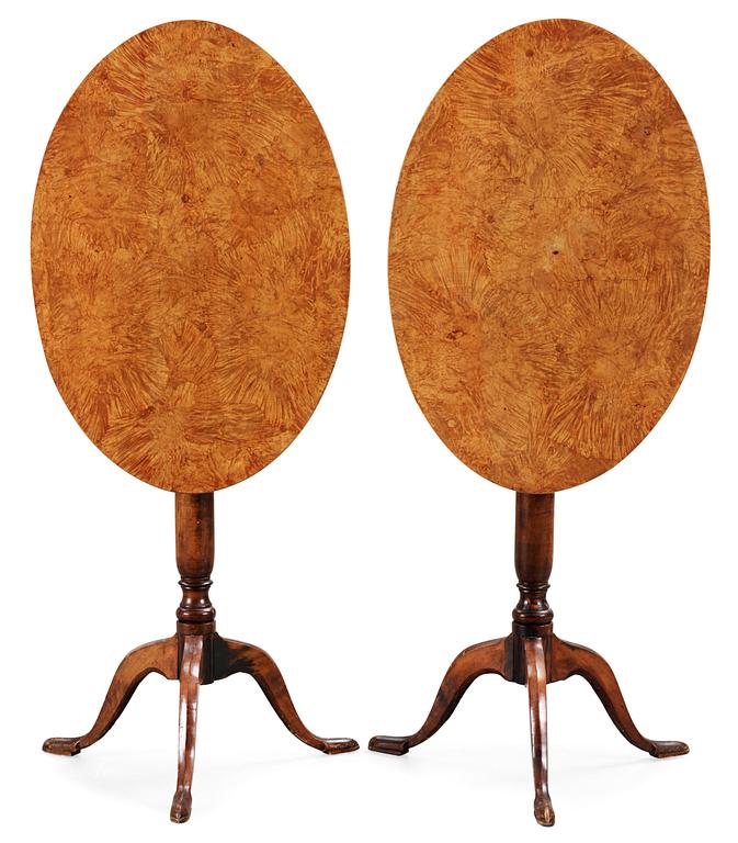A pair of Swedish 18th century tilt-top tables.