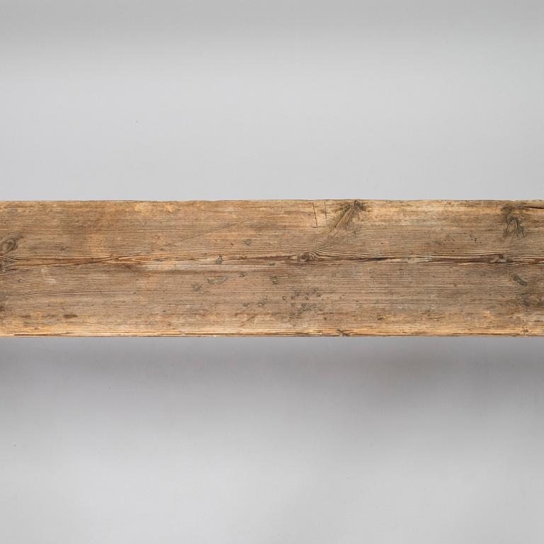A folk art bench, circa 1900.