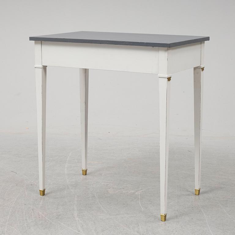 A Gustavian style table, first half of the 20th century.