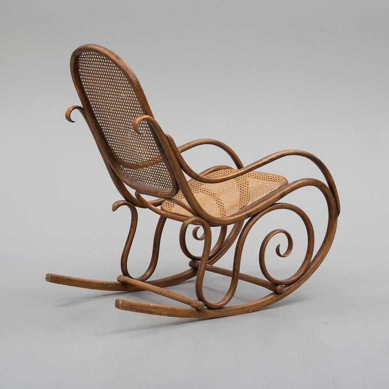 An early 20th century rocking chair.