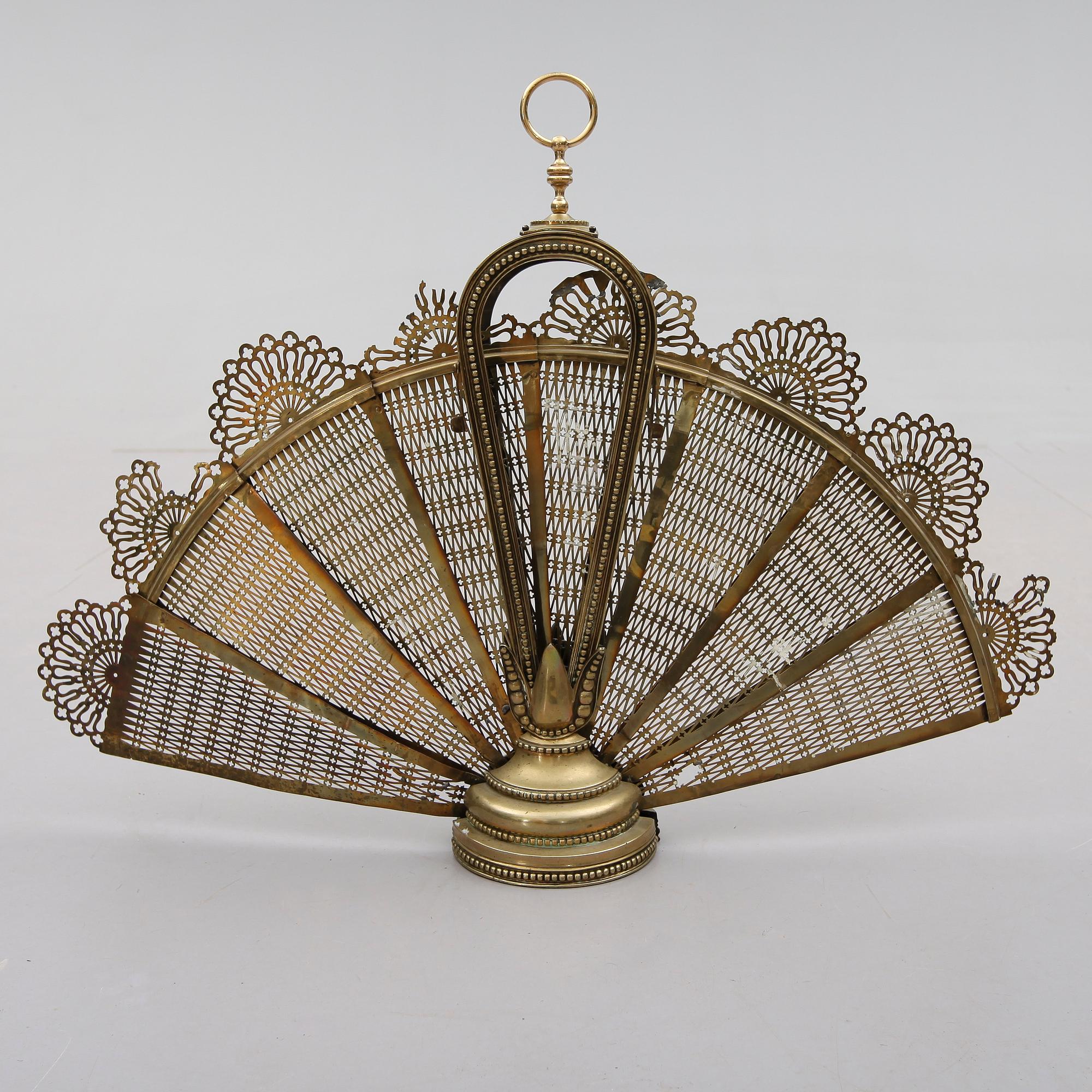 BRASSKYDD, mässing, 1900-talets första hälft.