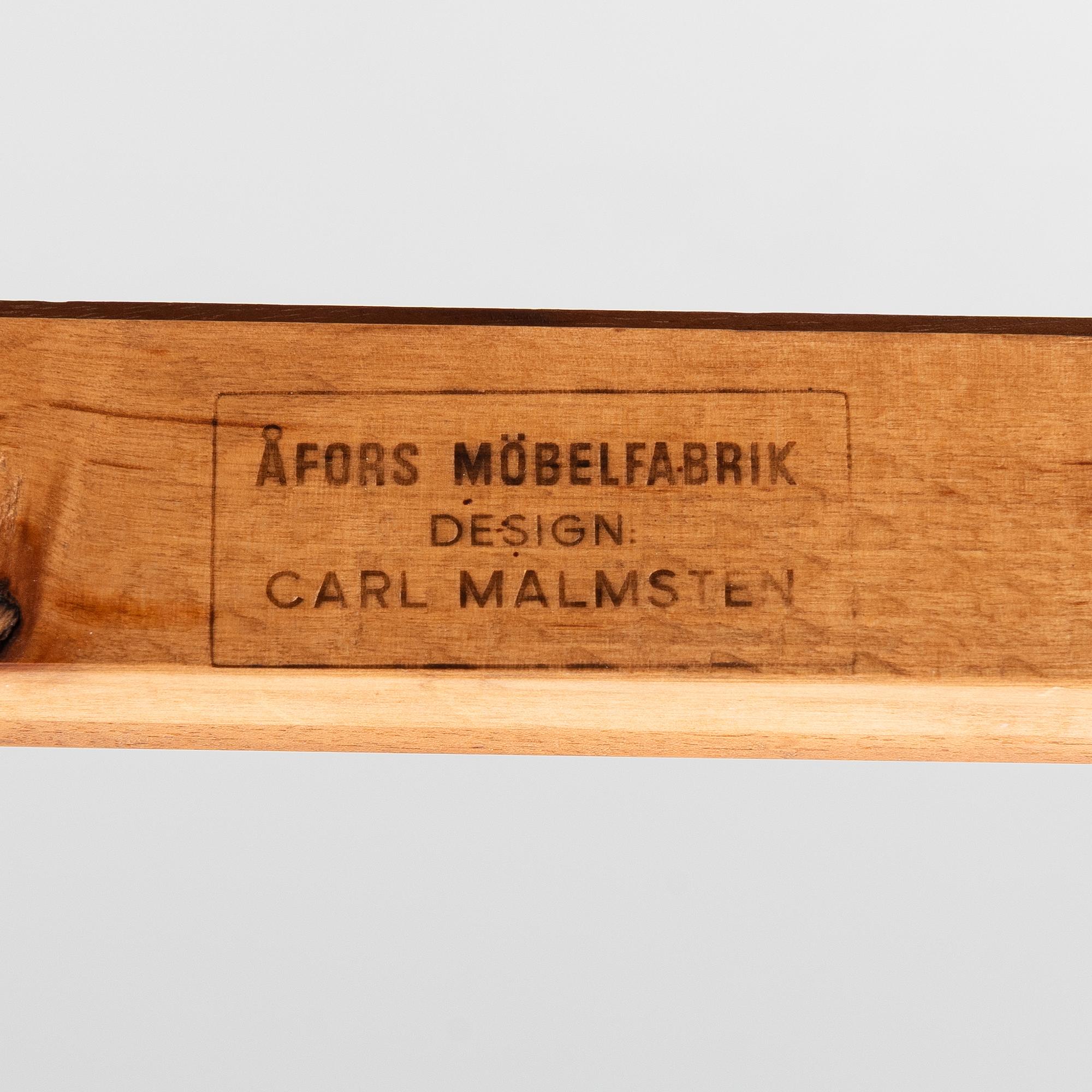 Carl Malmsten, Dining table with 2 armchairs and 6 chairs, 'Ambassador', Åfors Möbelfabrik, second half of the 20th century.