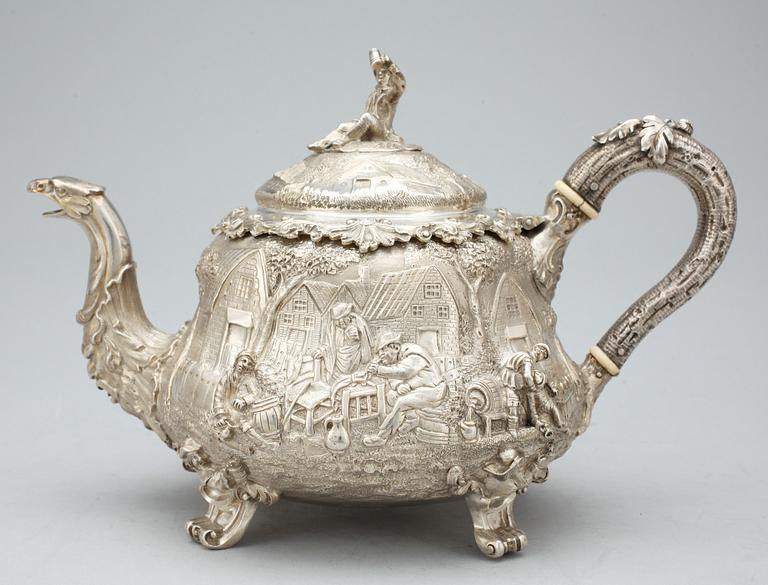 An English 19th century parcel-gilt tea-pot, marks of John Samuel Hunt, London 1849.