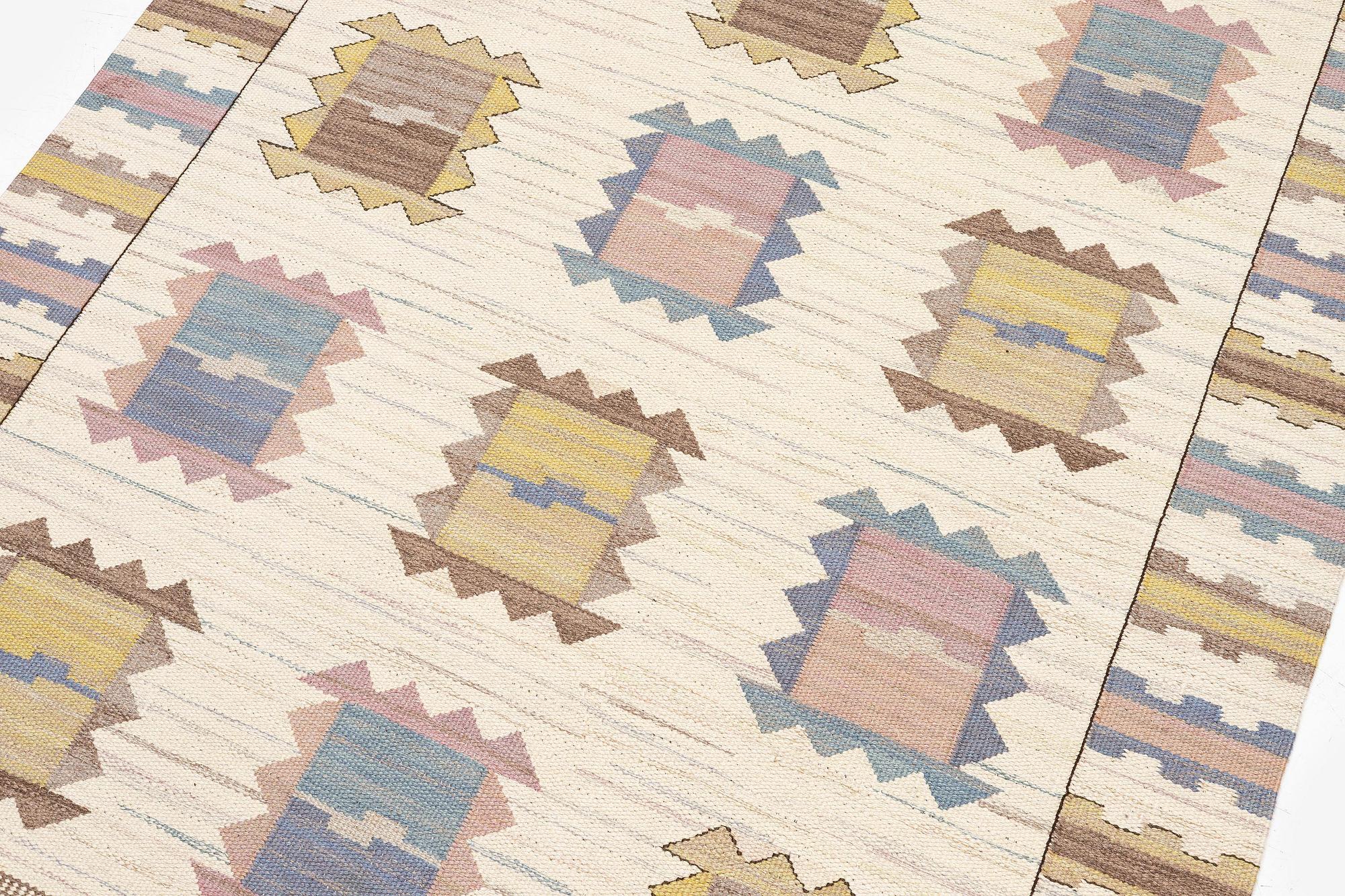 Märta Måås-Fjetterström, a carpet 'Ljusa plador', flat weave, c. 262 x 162 cm, signed AB MMF.