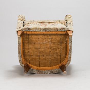 A mid-20th-century armchair.