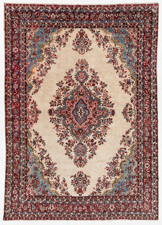 An oriental carpet, c. 370x260 cm.