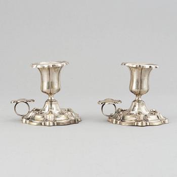 A pair of Swedish 19th century silver chamber-candelsticks, mark of Christian Hammer, Stockholm 1870.