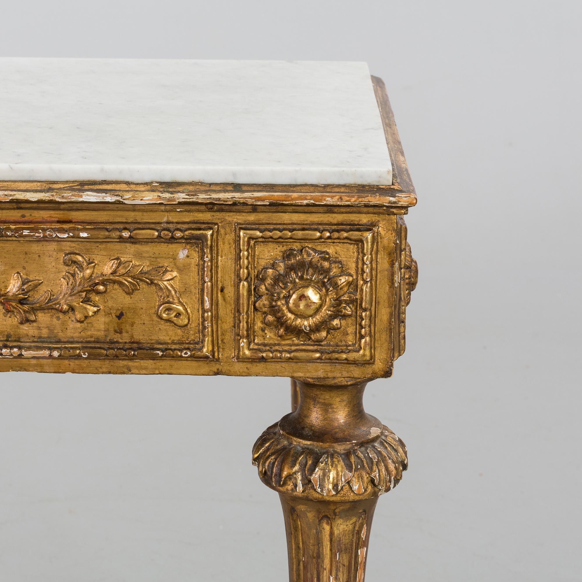 A LOUIS SEIZE STYLE CENTER TABLE.
