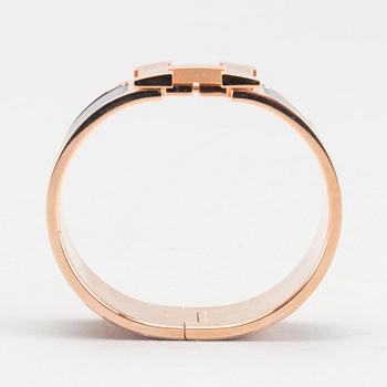 A Hermès "Clic-H" bracelet.