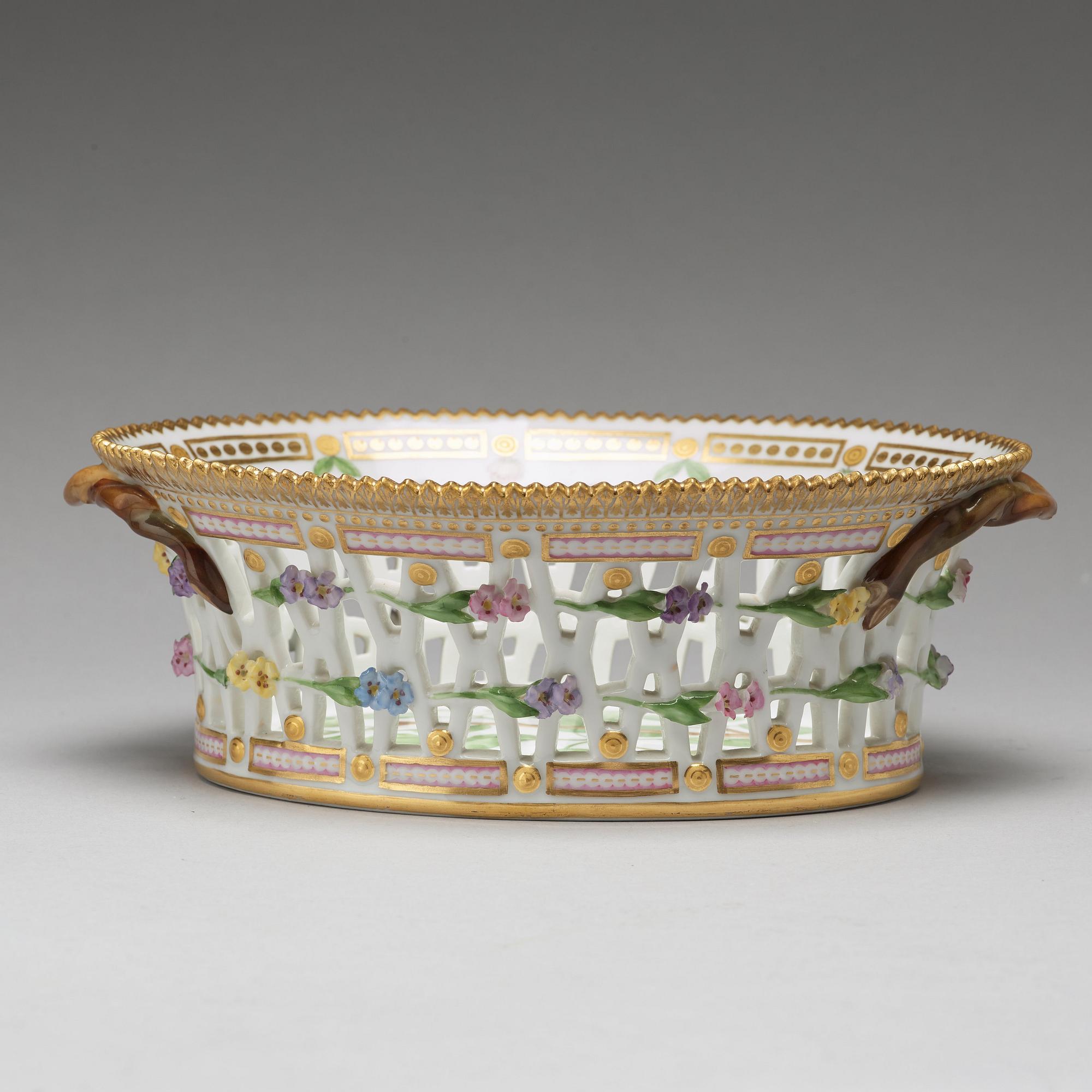 A Royal Copenhagen "Flora Danica" chesnut basket with stand, Denmark, 20th Century.