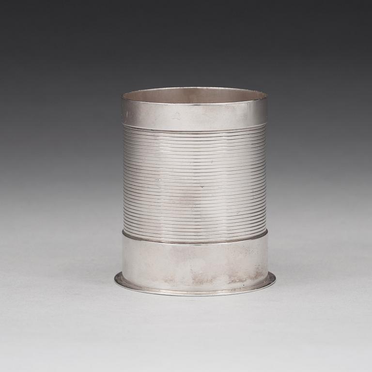 Sigvard Bernadotte, A Sigvard Bernadotte sterling bottle holder (for beer bottle), Georg Jensen, Copenhagen 1925-32.