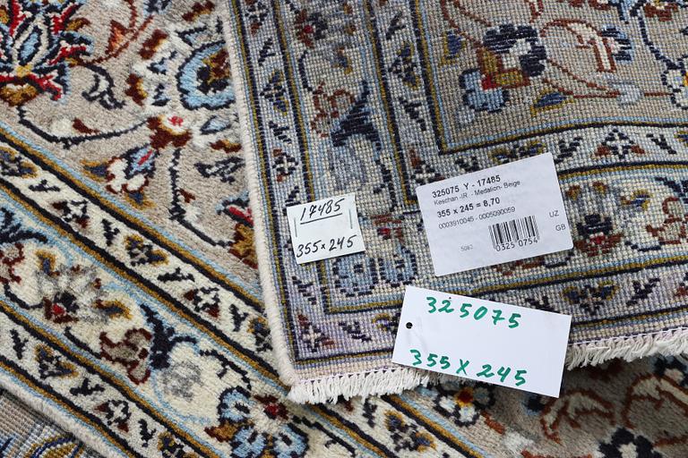 A Kashan carpet, c. 355 x 245 cm.