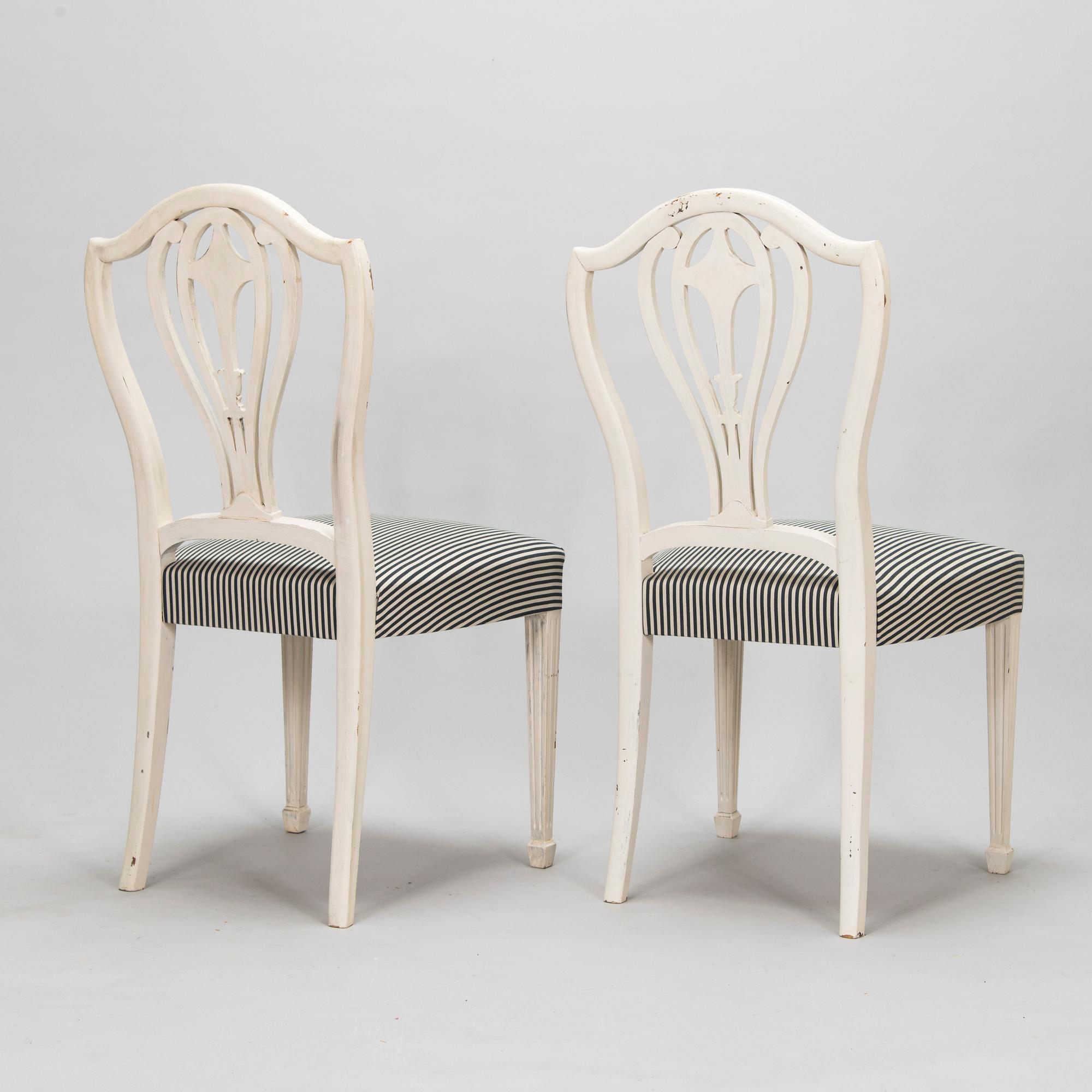 Four George III style chairs, early 20th century.