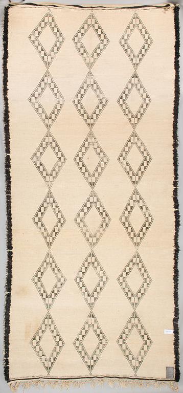 A Moroccan Beni Ourain carpet. circa 420x196 cm.