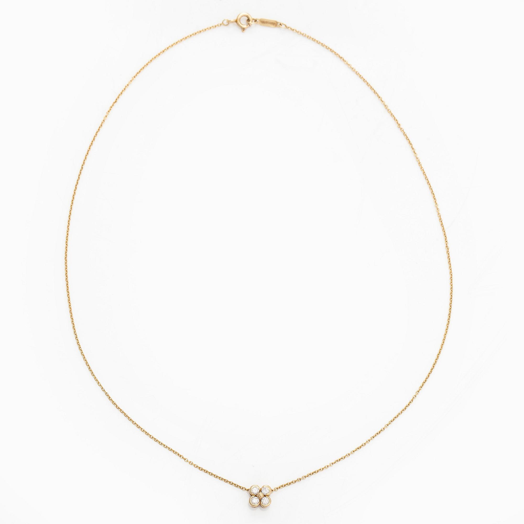 Tiffany & Co, an 18K gold necklace with diamonds.