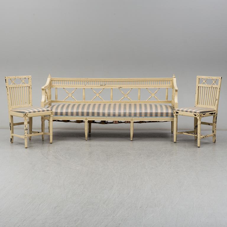 An early 19th century sofa and a pair of chairs.