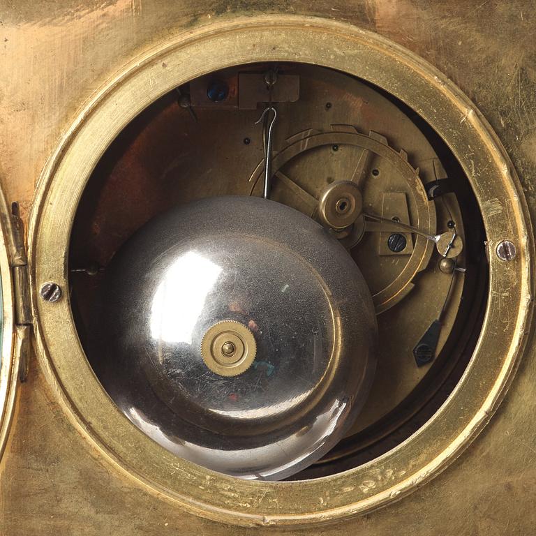 A Empire early 19th century gilt bronze mantel clock.
