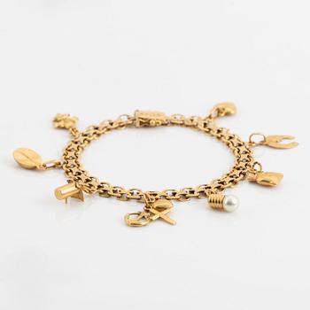 18K gold bracelet, with charms.