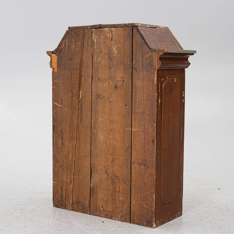 A cabinet, dated 1824.