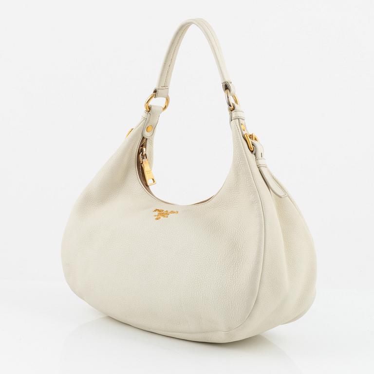 Prada, a white leather bag.