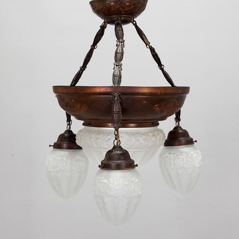 An Art Nouveau ceiling lamp, early 20th century.