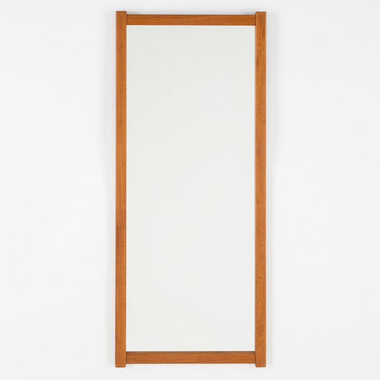 A Swedish teak mirror, Fröseke Nybrofabriken, 1950s / 60s. Signed with label.