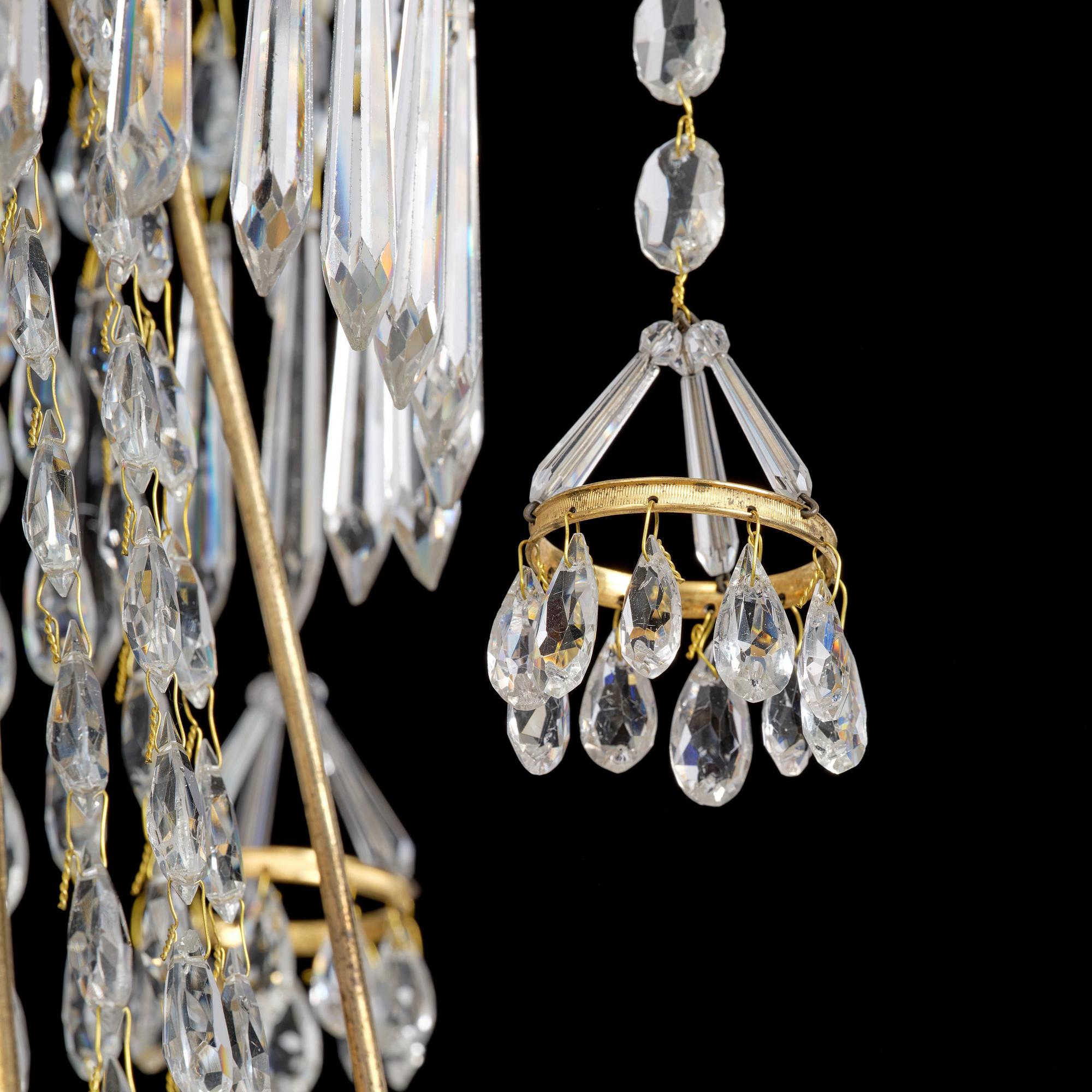 A late Gustavian gilt brass and cut glass seven-light chandelier, Stockholm, late 18th century.