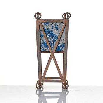 Tage Andersen, a patinated metal flower pot, Denmark, end of 20th century.