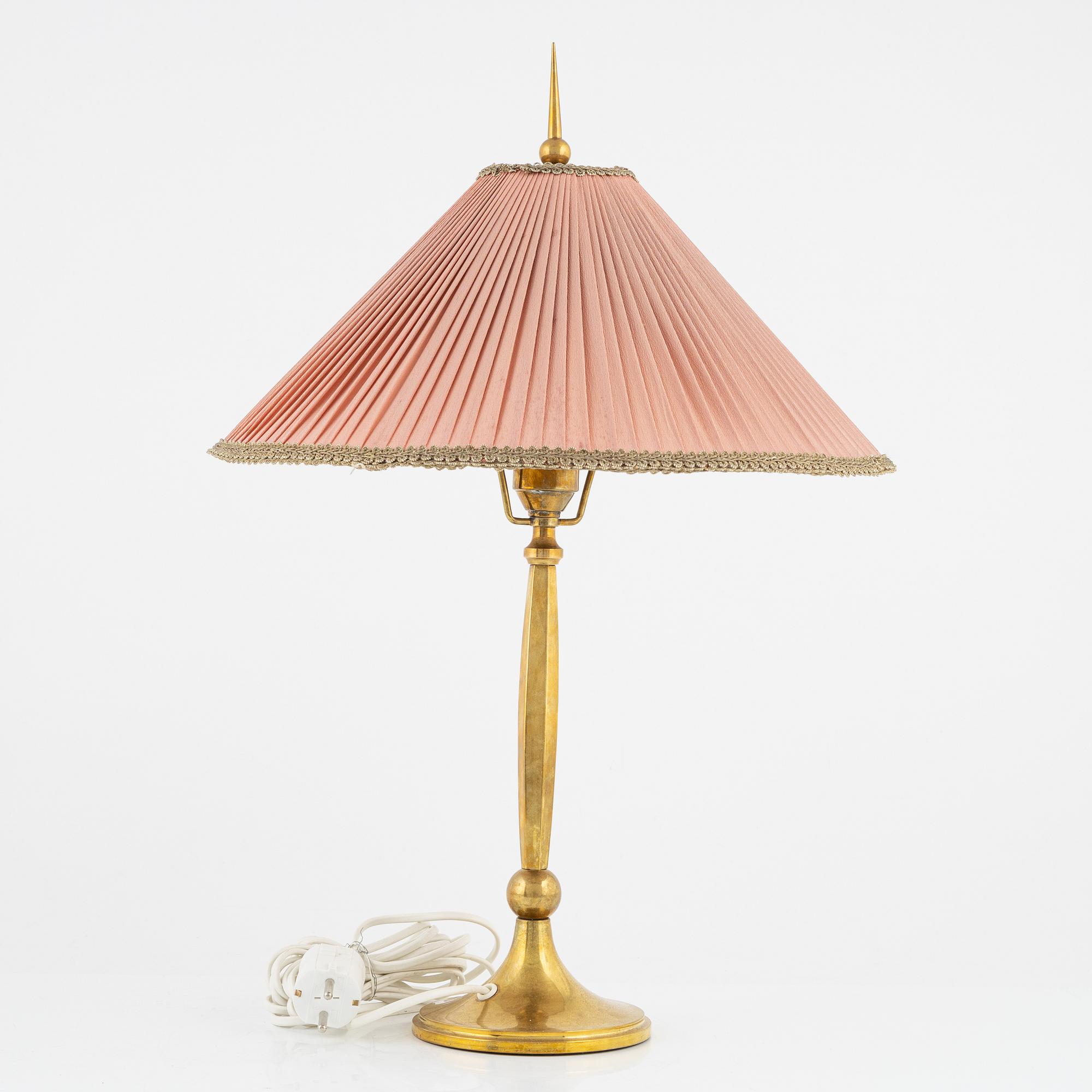 Harald Notini, a Swedish Grace '6851' brass table light, Arvid Böhlmarks Lampfabrik, Stockholm, 1920's.