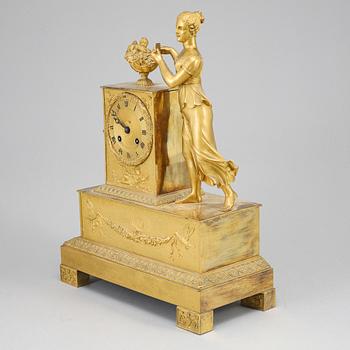 An Empire mantel clock, beginning of the 19th ct.