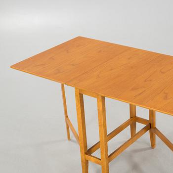 A gate-legged table by Edsbyverken in 1959.