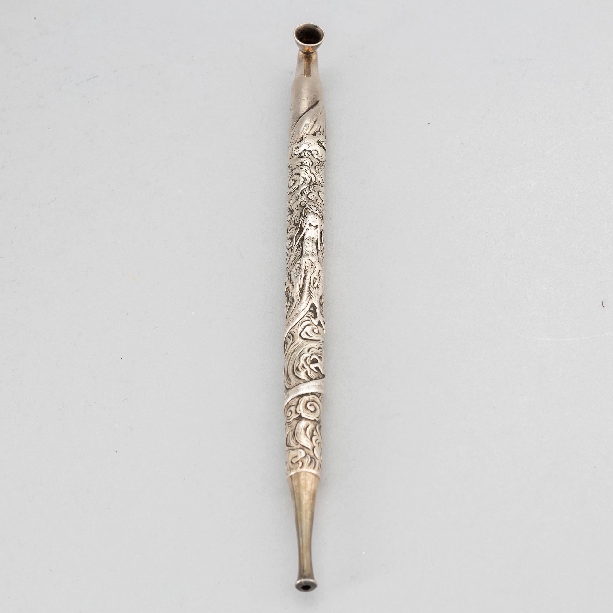 A Japanese silver opium pipe, Meiji period (1868-1912).