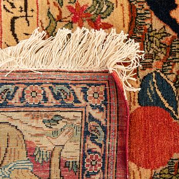 A semiantique signed Kashan carpet ca 203x135 cm.