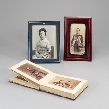 Two signed photographs of the Japanese crown prince and his wife and a photo album.