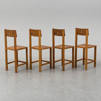 MARIO PRANDINA, an oak table and four chairs, Plinio Il Giovane, Italy.
