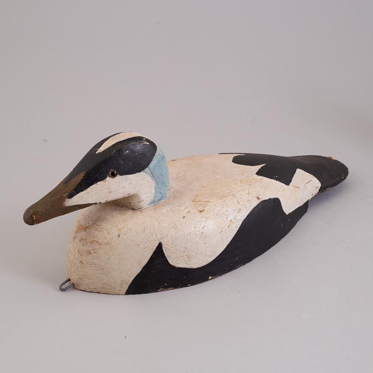 4 painted wooden ducks from the 20th century.