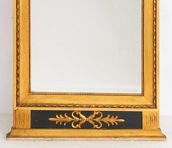 An late Gustavian style mirror and a console table, first half of the 20th Century.