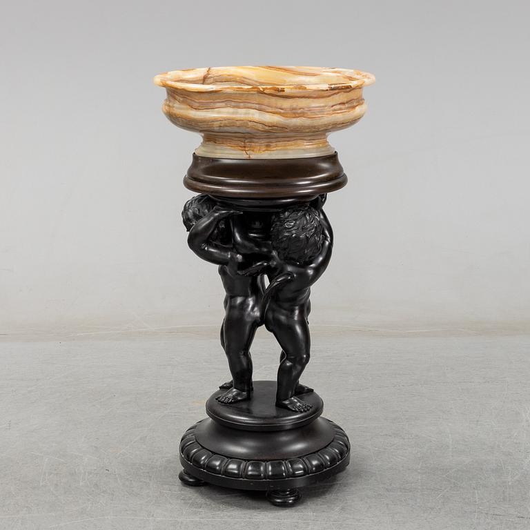 A wooden pedestal with onyx bowl, 20th Century.