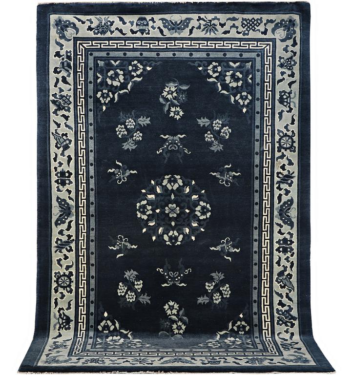 A carpet, China, Antique Finish, ca 250 x 152 cm.