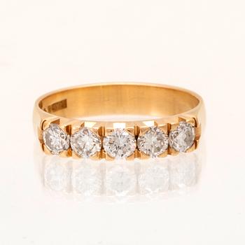 An 18K gold half eternity ring set with round brilliant cut diamonds, Wadring-Juvel Karlskrona 1986.