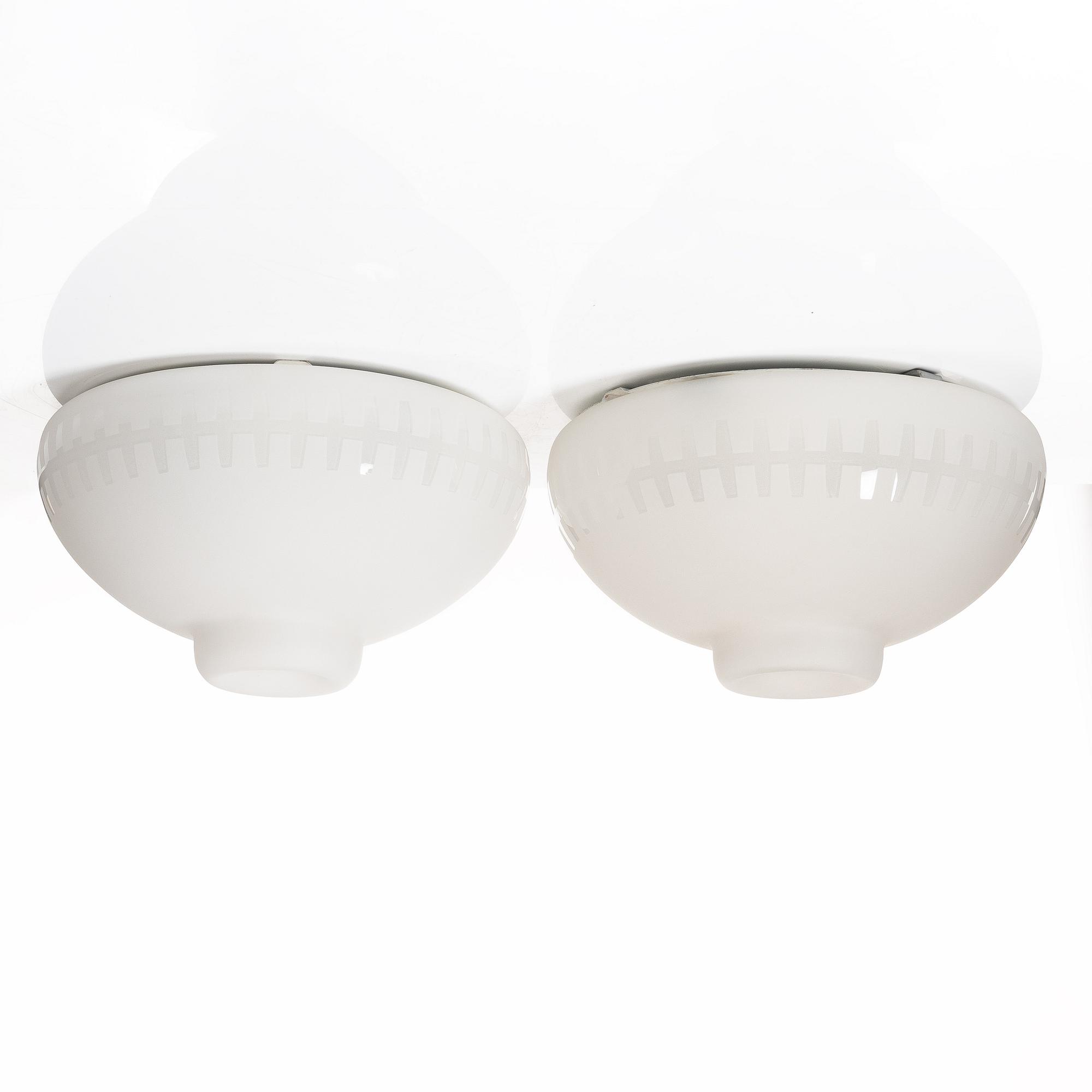 Harald Notini, or Uno Westerberg, a pair of ceiling lamps model "12012", Arvid Böhlmarks Lampfabrik, Stockholm, 1950s.