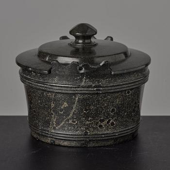 A serpentine stone butter box and cover circa 1800.