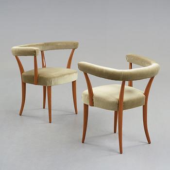 Josef Frank, a pair of mahogany horseshoe chairs, Svenskt Tenn, Sweden, mid 20th Century, model 966.