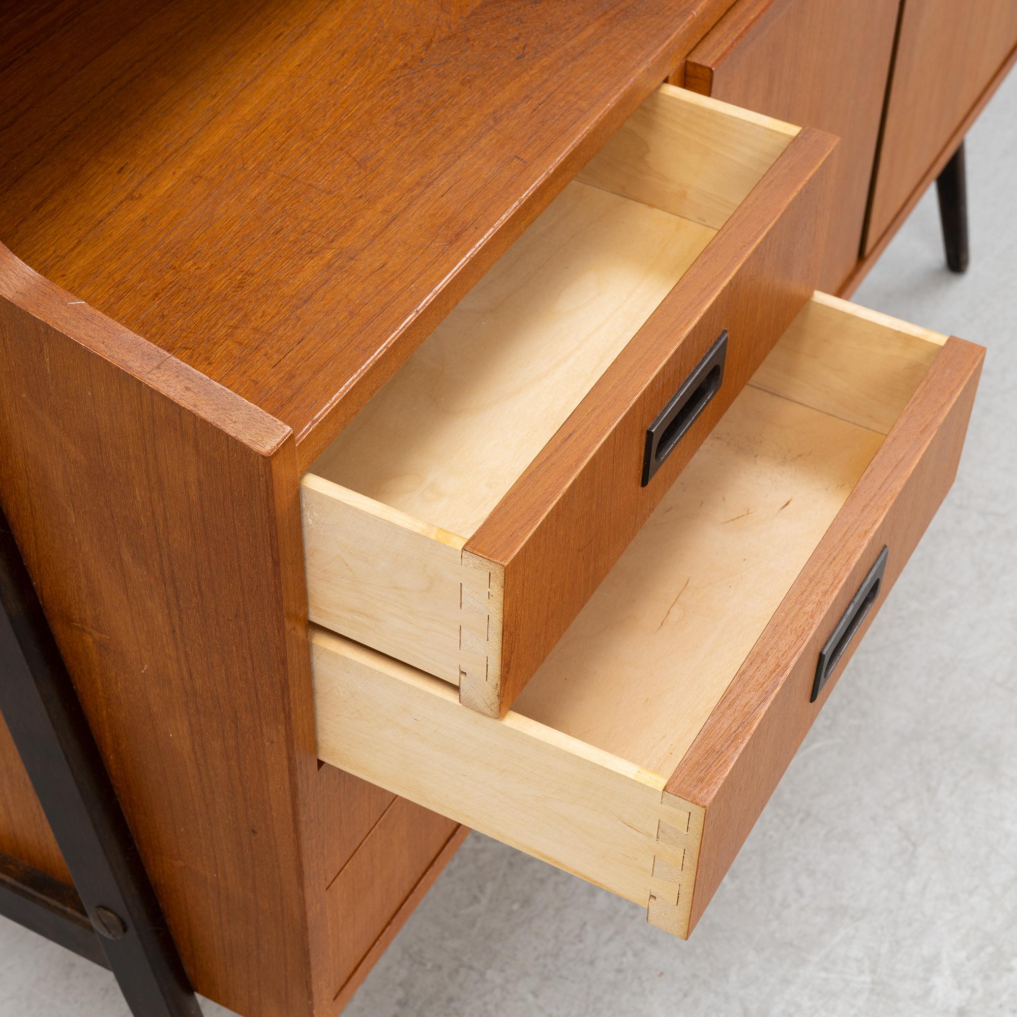 A teak veneered bookcase, mid 20th Century.