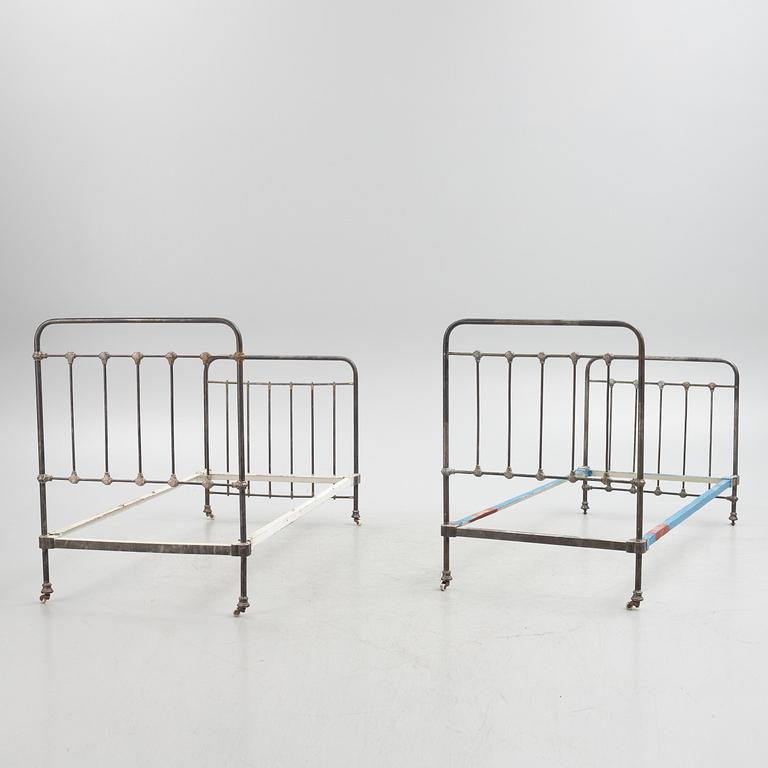 Two metal bed-frames from Nordiska Kompaniet, early 20th century.