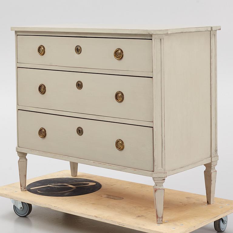 A Gustavian style chest of drawers, early 20th Century.