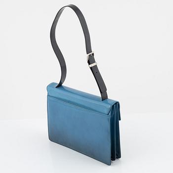 Prada, a blue patent leather bag.